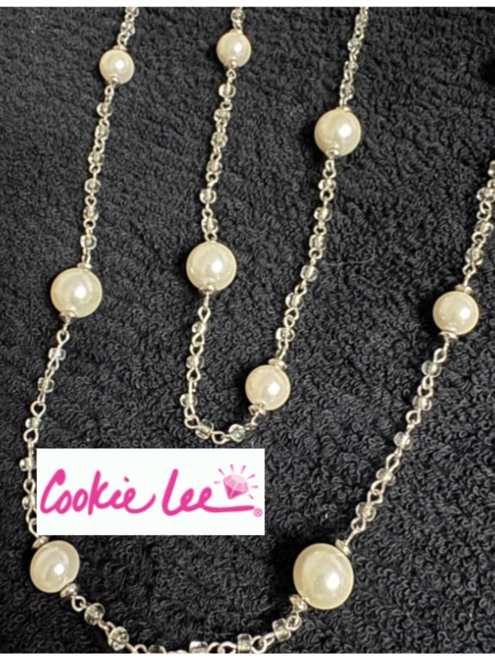 Vintage 58" Cookie Lee pearl station necklace.